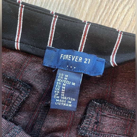 Black flare pants with red/white stripes. - Picture 3 of 4